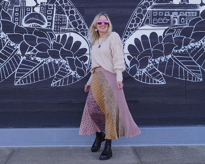mixed media skirt, statement sleeve sweater and combat boots