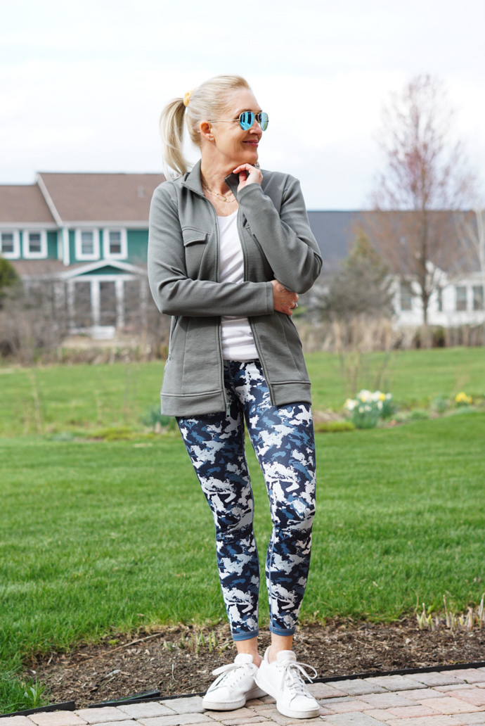 athleisure outfit with green utility jacket