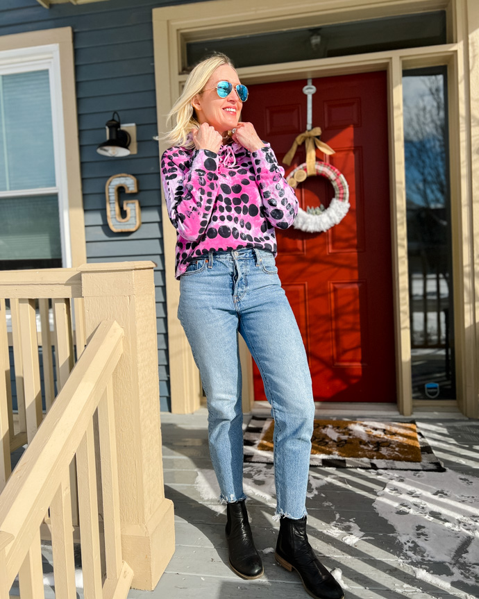 bold bright pink and black polka dot hoodie