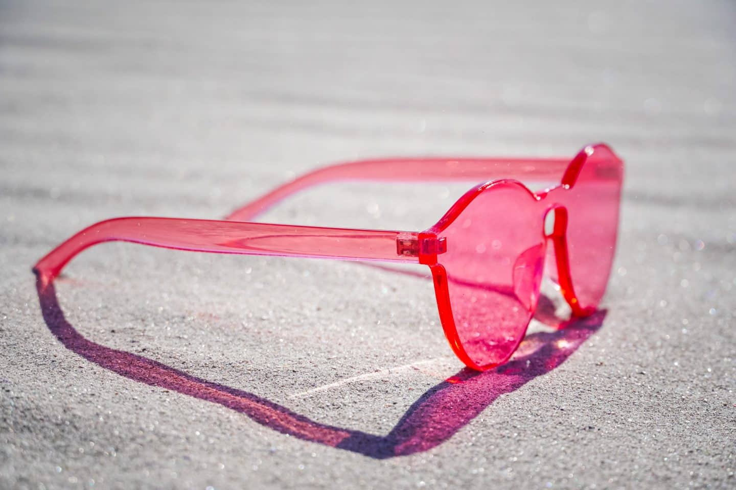 Rose tinted glasses for light 2025 sensitivity