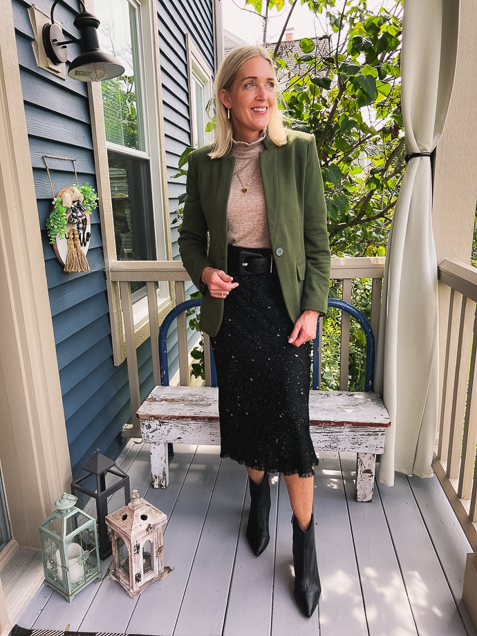 olive green blazer styled with a midi skirt